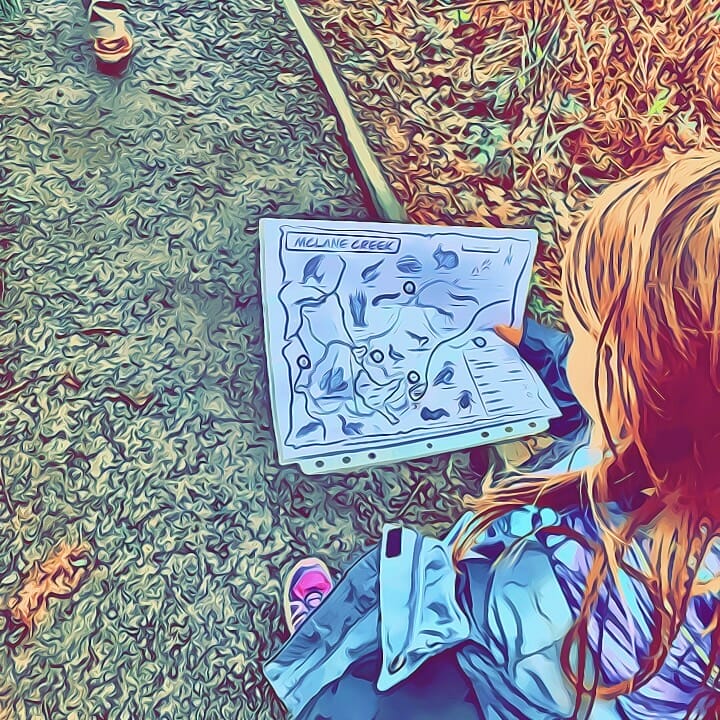 Young Girl Working off of her trail activity Map